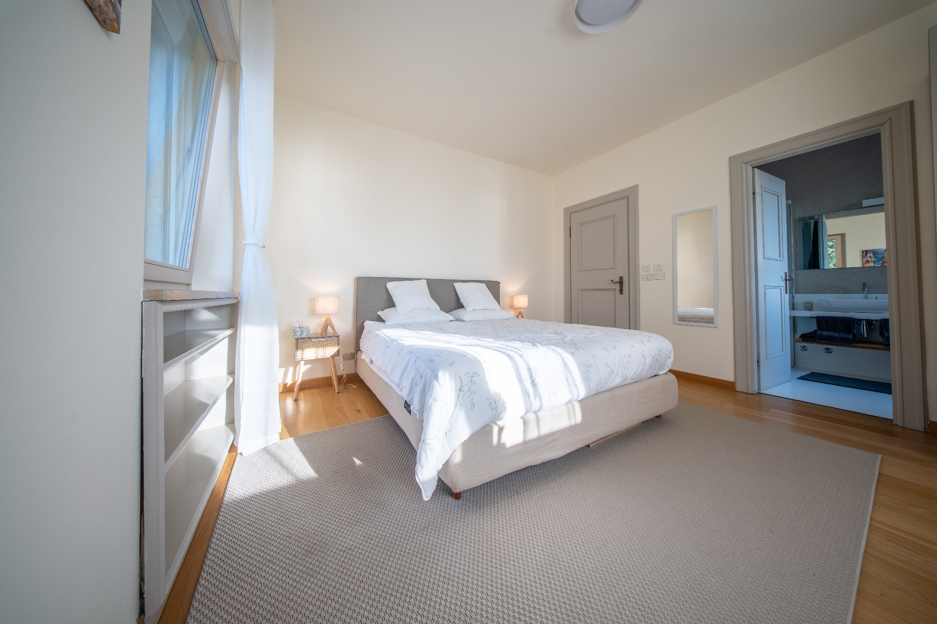 Bright king bedroom with ensuite bathroom