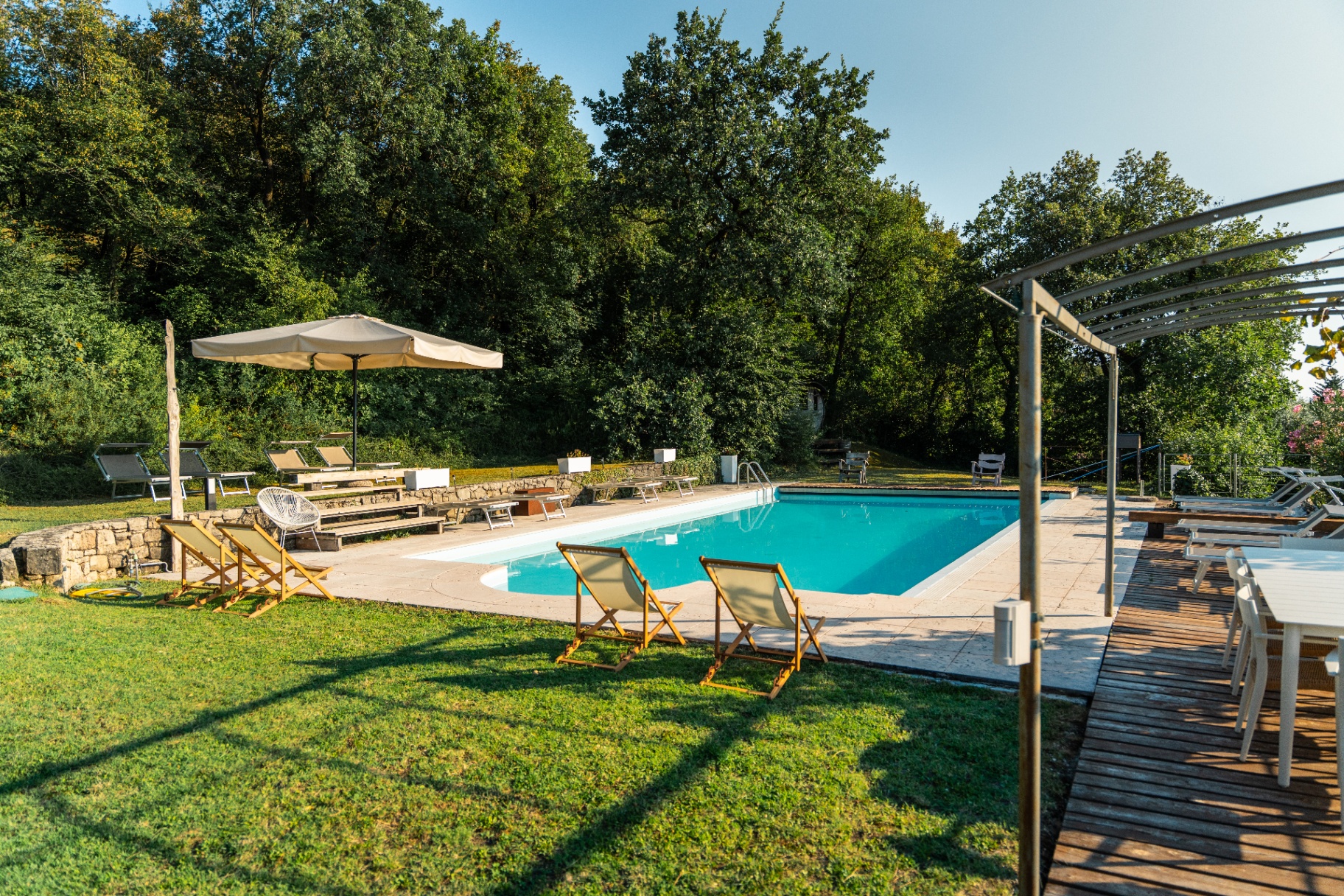 Pool terrace with pergola shade
